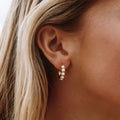 Mini Pearl Huggies Earrings 1