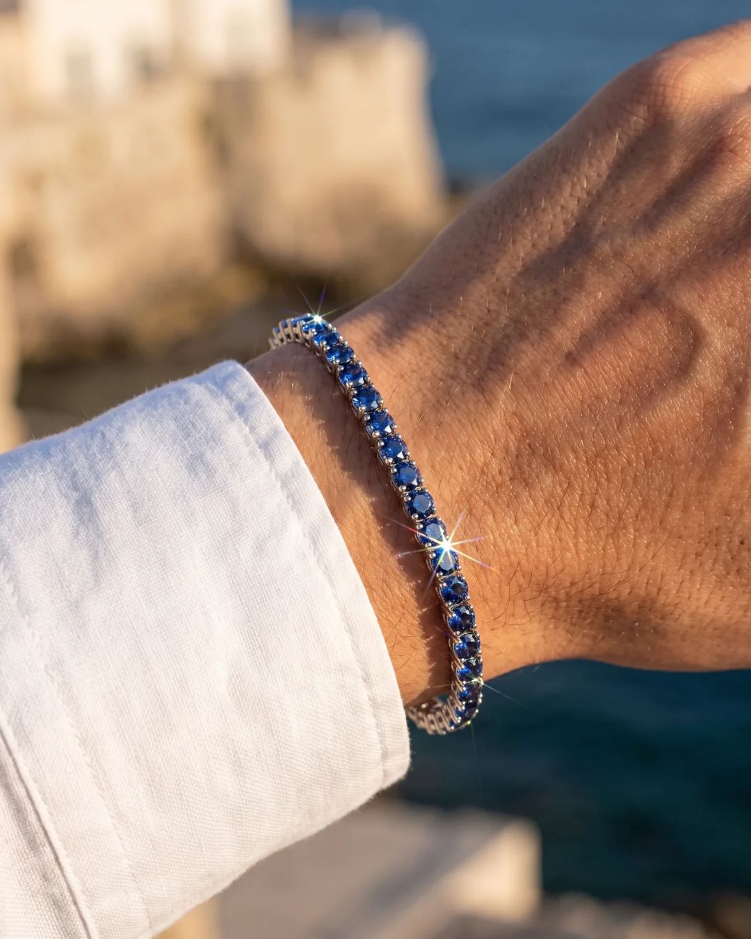 Royal Blue Moissanite Tennis Bracelet, 4 mm, 925 Sterling Silver — Bracelet worn with a white cuff