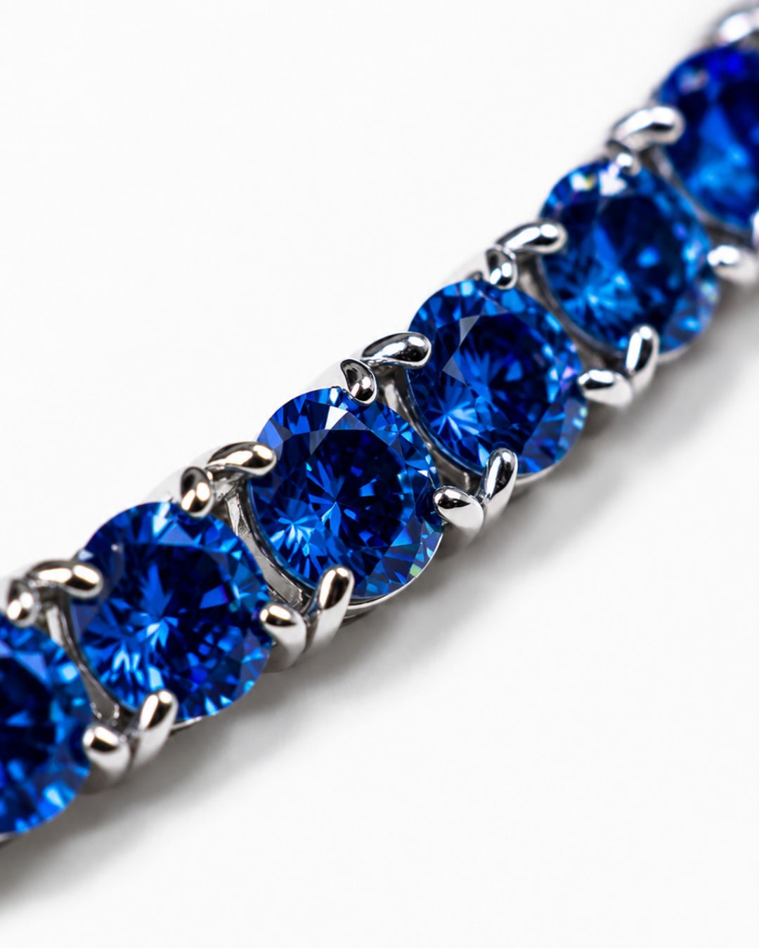Royal Blue Moissanite Tennis Bracelet, 4 mm, 925 Sterling Silver — Close-up of round blue stones