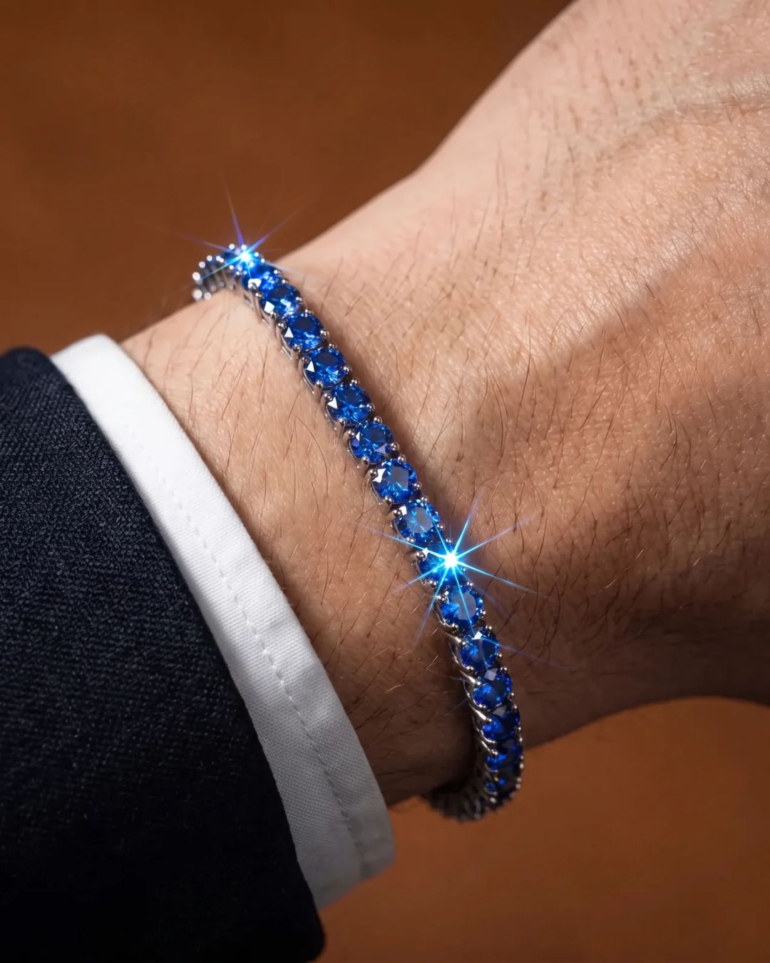 Royal Blue Moissanite Tennis Bracelet, 4 mm, 925 Sterling Silver — Bracelet worn with a dark sleeve