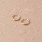 Tiny Huggie Hoops 7